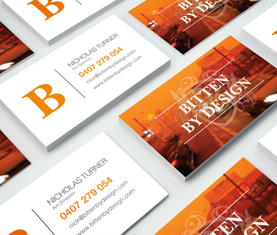 Bitten By Design - Business Cards on table